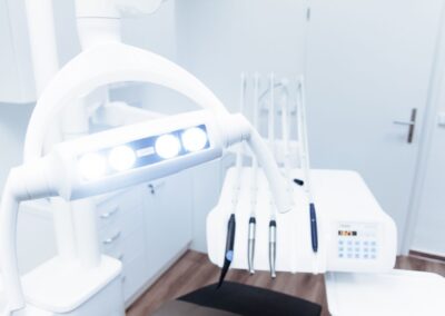 Bright and clean modern dental clinic room with advanced dental equipment.